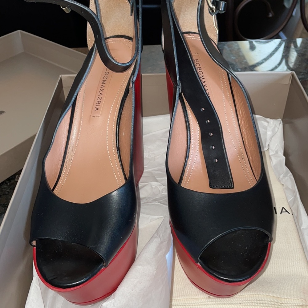 Gently used BCBGMaxazria black and red platform heels.  Excellent condition. 9.5